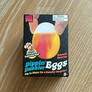 NEE DOH Dippin' Dazzler Eggs - Smooth Sunrise Color Changing Squishy Egg